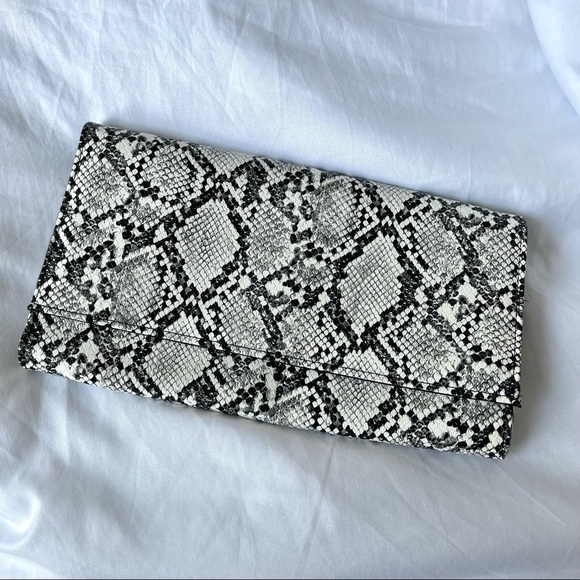 Handbags - NEVER USED snakeskin clutch from these3boutique